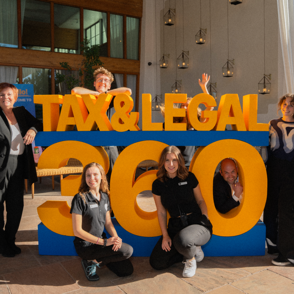 Tax & Legal 360 sign group photo