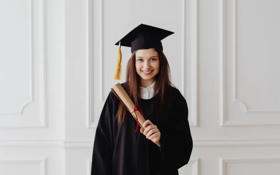 girl wearing cap and gown