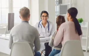 family talking with a nice female doctor