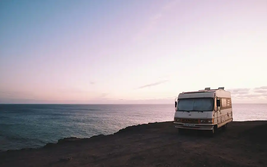 RV at the beach at sunset